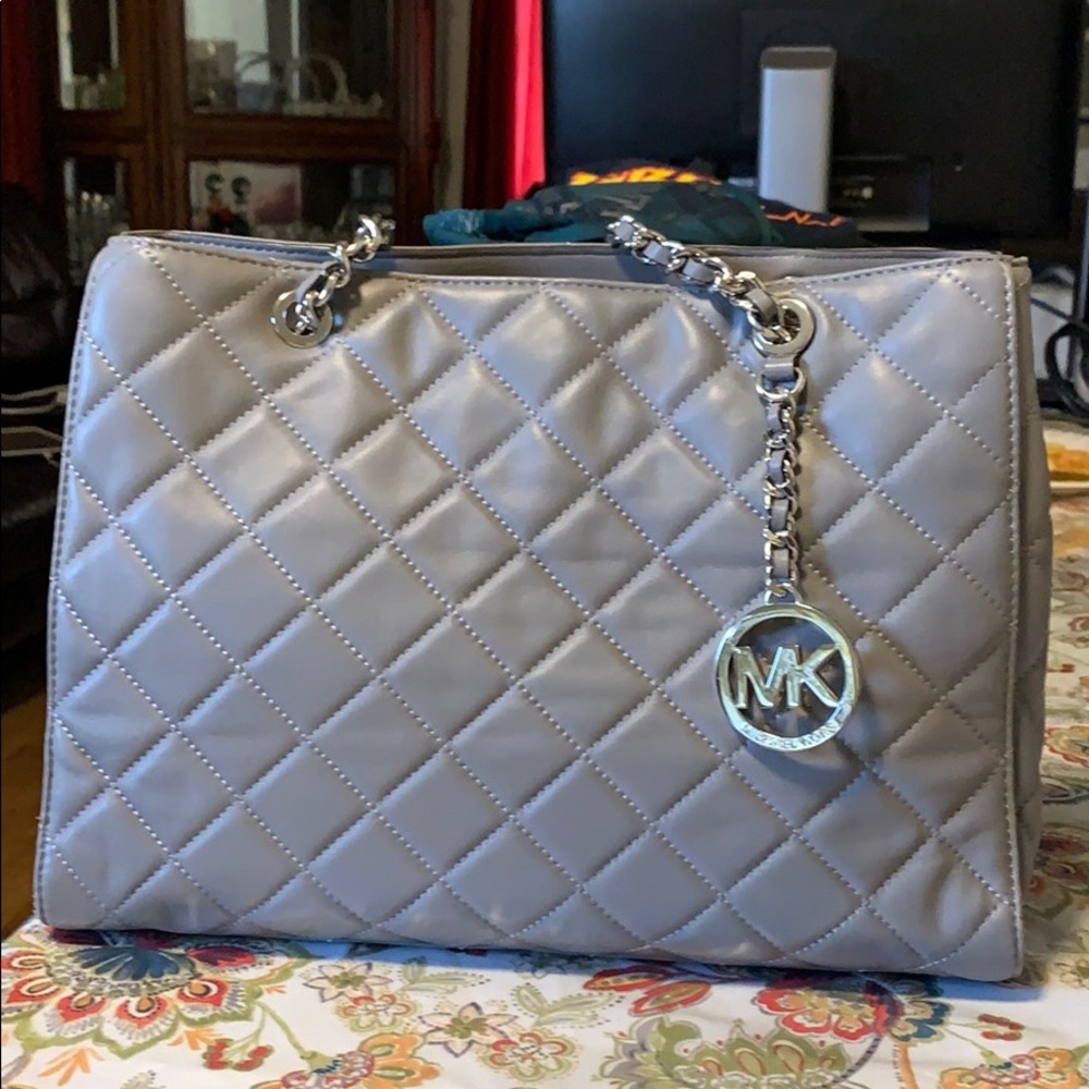 Grey quilted Michael Joe’s hand bag